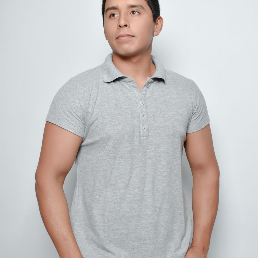 Man wearing a plain grey polo shirt, studio shot