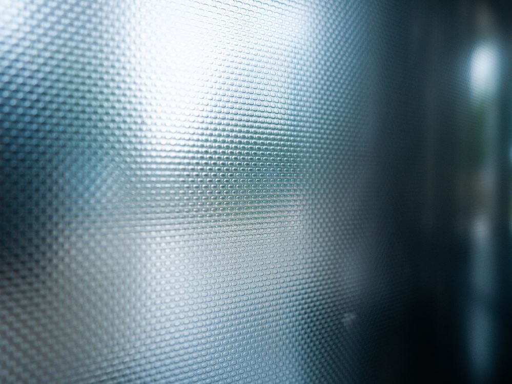 Glass office partition with frosted film