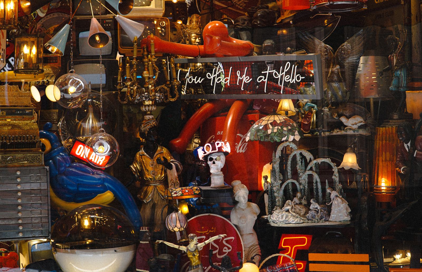 Shop window display with neon signs and merchandise