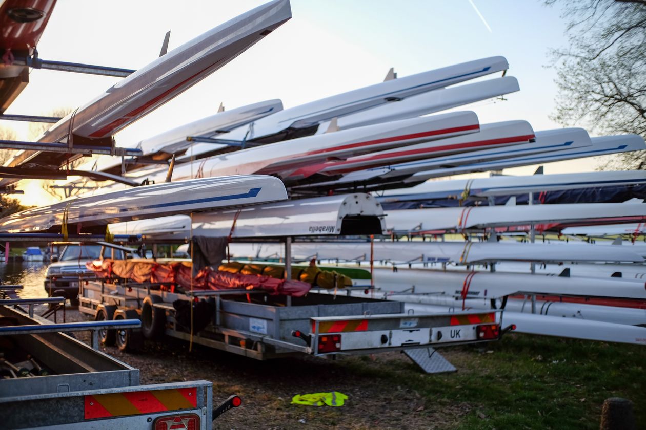 Boat trailer stacked with rowing shells ready for transport