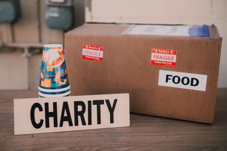 Charity donation box filled with food supplies