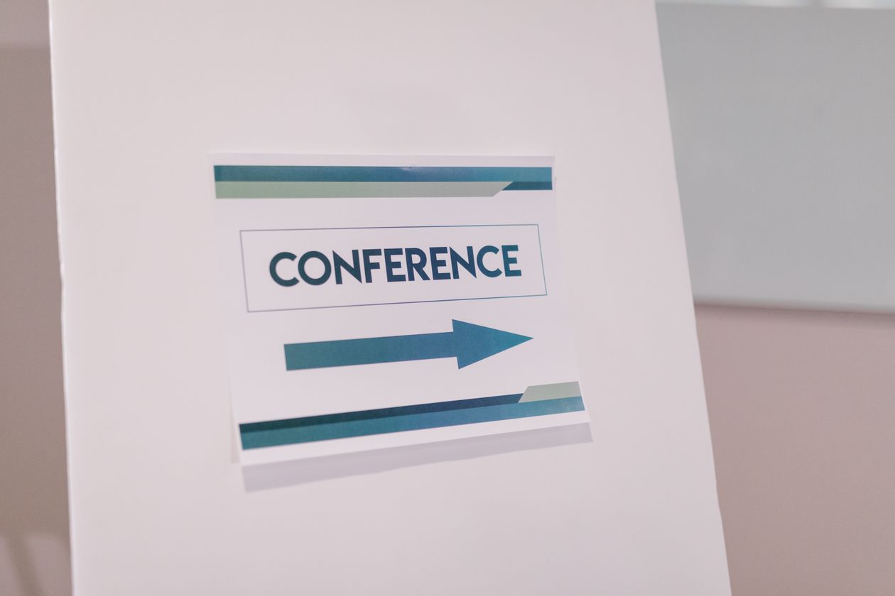 Conference directional sign on an easel