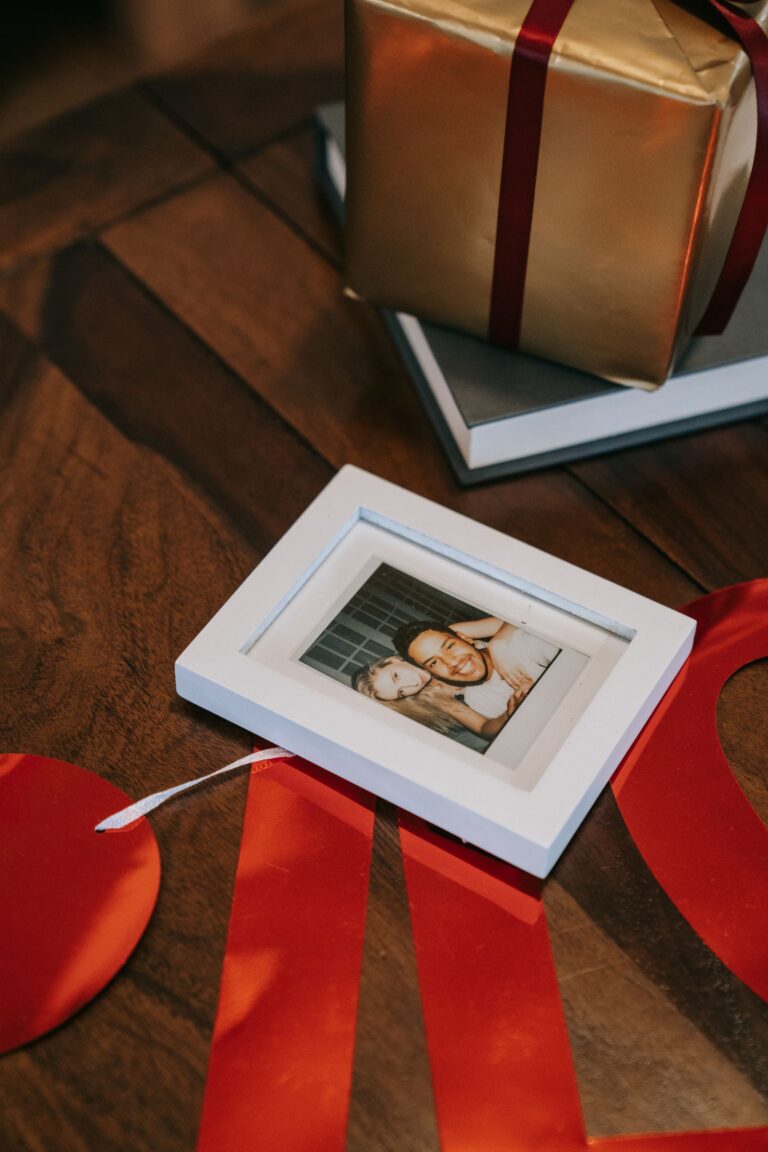 Small framed couple photo beside a wrapped gift