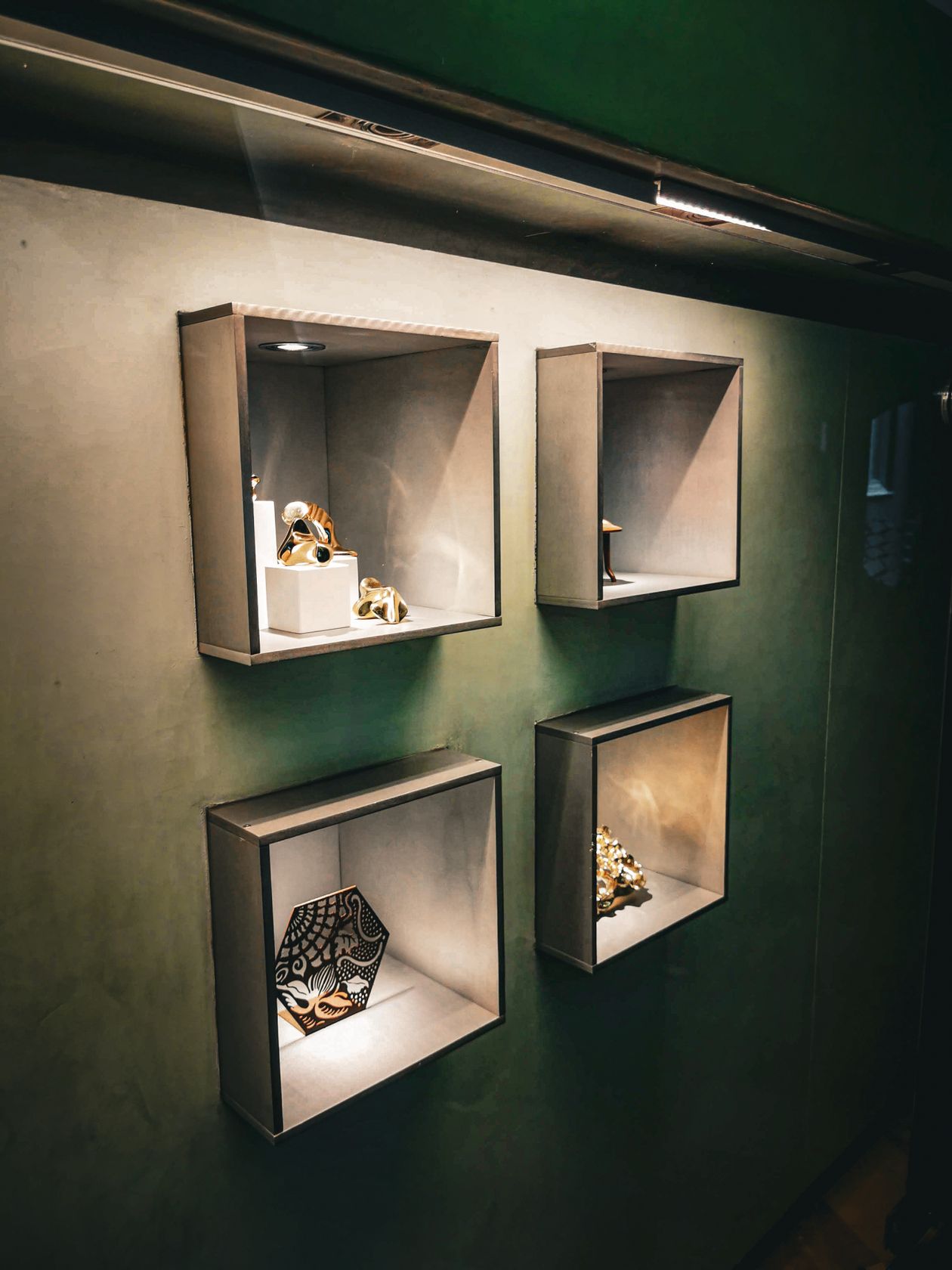 Illuminated wall display niches showcasing exhibits