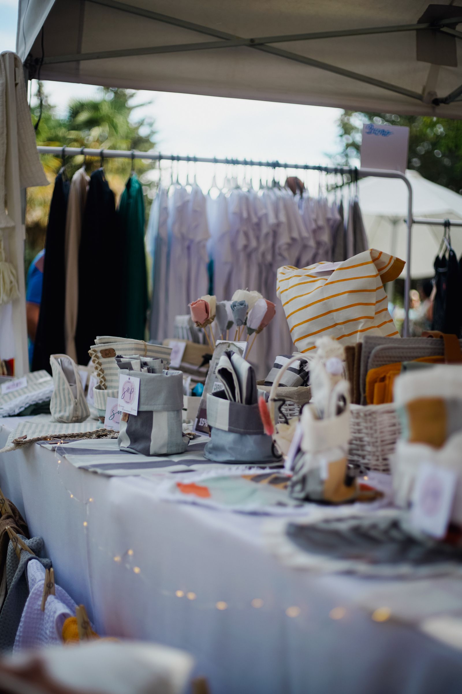 Market stall table with handmade merchandise on display