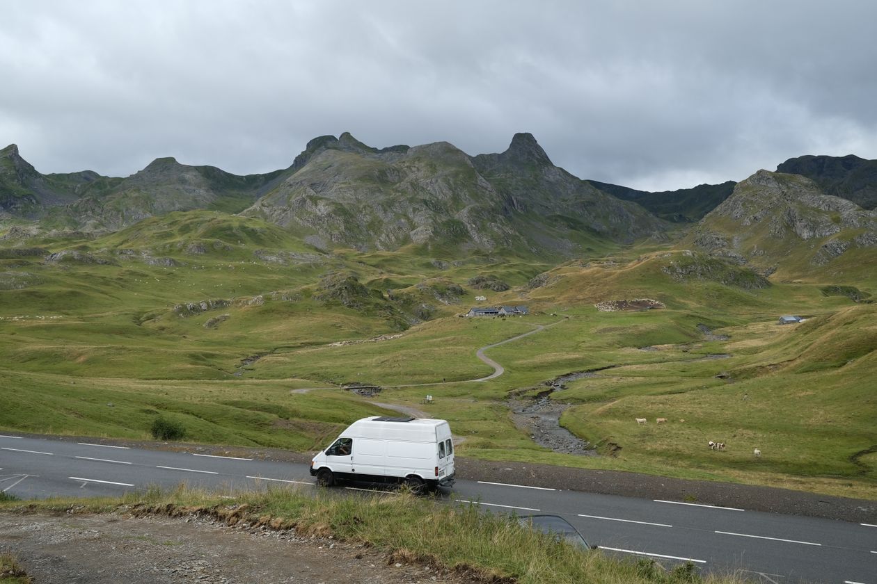 White van driving along a countryside road